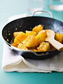 Pan-fried pineapple caramelized with coconut and lime zests