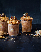 Praline pear muffins with walnut crumble