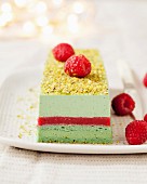 Pistachio-raspberry Christmas log cake