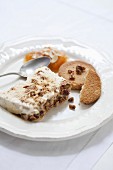 Whipped ice cream , caramelized almonds and dried fruit terrine, shortbread biscuits and poached apricots