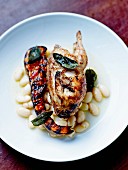 Roasted quail, Tarbais beans and roasted slices of pumpkin, sage oil sauce