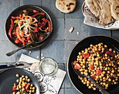 Pepper salad and chickpea salad with pita bread