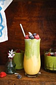 Kale cabbage and mango smoothie with summer fruit