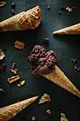 Dark chocolate ice cream in wafer cones