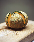 Mesh melon cut into four pieces