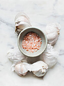 Bowl of pink Himalayan salt and garlic