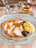 Roast turkey with prunes and apple sauce