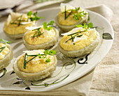 Artichoke bases garnished with scrambled eggs and parmesan