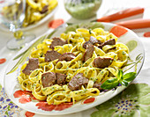 Tagliatelles with mint pesto and thinly sliced lamb