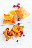 Orange and cranberry flaky pastry pies
