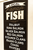 Sales sign of a fish shop, Alaska, USA