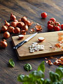 Sliced onions on a chopping board
