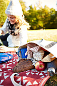 Young woman lying in the grass during a picnic in the park