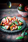 Tomatoes and basil salad with oliv oil