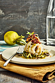 Rolled Cod Fillets With ,Artichokes,Chutney,Onions,Mussels,Green Beans,Olives And Lemon Zests