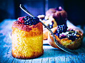 Blackberry and raspberry Cannelé-style small cakes