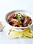 Udon noodles with caramelized chicken