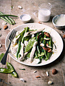 Sliced turkey fillets in almond milk,green beans,sweet peas and almonds