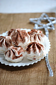 Meringues Sprinkled With Cocoa