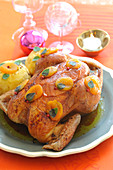 Caramelized capon with sweet and salty dried apricot stuffing