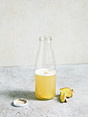 Ginger juice with apple cider vinegar and maple syrup