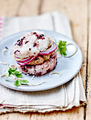 Black and white sticky rice veal and coriander burger
