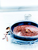 Cinnamon-flavored red quinoa pudding