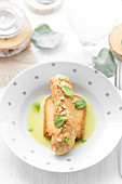 Breaded white sausage with a watercress coulis