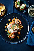 Jumbo shrimps and cod with mango-pumpkin tartare,jacket potatoes