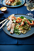 Tagliatelles saute with jumbo shrimps,spinach,lime and chicken fillets