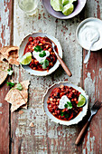 Two bean,tomato and chili pepper Mexican salad with lime