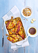 Roasted chicken with dried apricots and almonds on couscous
