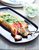 Half-cooked gravad salmon with cucumber cream
