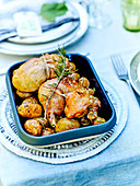 Lemon and bay leaf roasted chicken thighs with rosemary potatoes