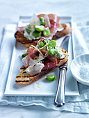 Crostini with beans, prosciutto and mint cream cheese