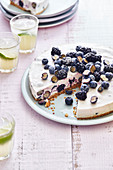 Blueberry and blackberry cheesecake, sliced