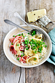 Pappardelle with ham, peas and pepper pecorino