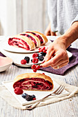 Rolled pancakes with summer fruit filling