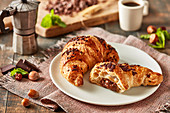 Croissants garnished with chocolate and hazelnut spread