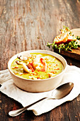 Cream of vegetable soup with shellfish