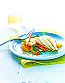 Dab fillets with pan-fried vegetables