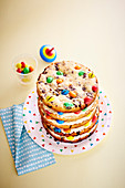 Small cookie layer cake with colourful candies