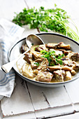 Normandy-style veal with pleurotus mushrooms