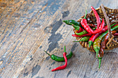Small basket of red and green chili peppers