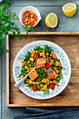 Pan-fried salmon with squash,chickpeas and kale cabbage