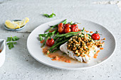 Pollock in crumble, green beans and cherry tomatoes
