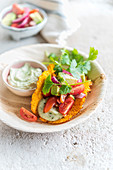 Carrot tacos with tomato salad and avocado