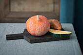 Autumn vegetables on a wooden chopping board