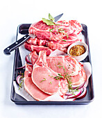 Raw pork ribs and raw pork loin