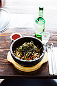Korean noodle dish with soju